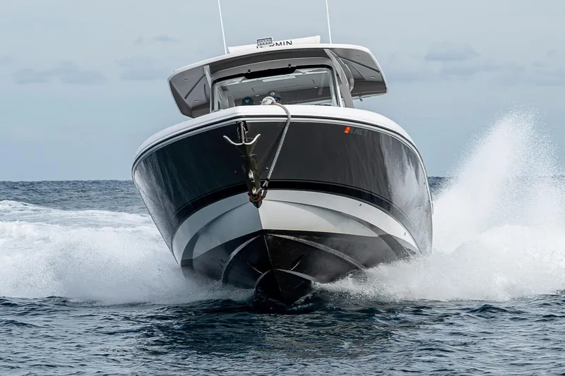 Slide: The Image of 2023 Intrepid 427 Nomad SE cruising powerfully through ocean waves. - 135