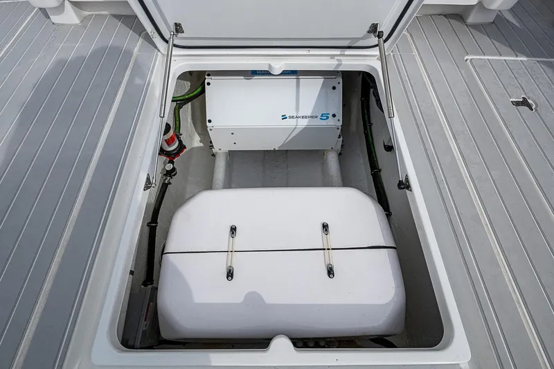 Slide: The Image of 2023 Intrepid 427 Nomad SE boat compartment with Seakeeper 5 stabilizer system. - 25