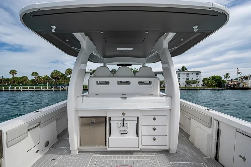 Slide: The Image of 2023 Intrepid 427 Nomad SE boat interior with sleek design and modern amenities. - 28