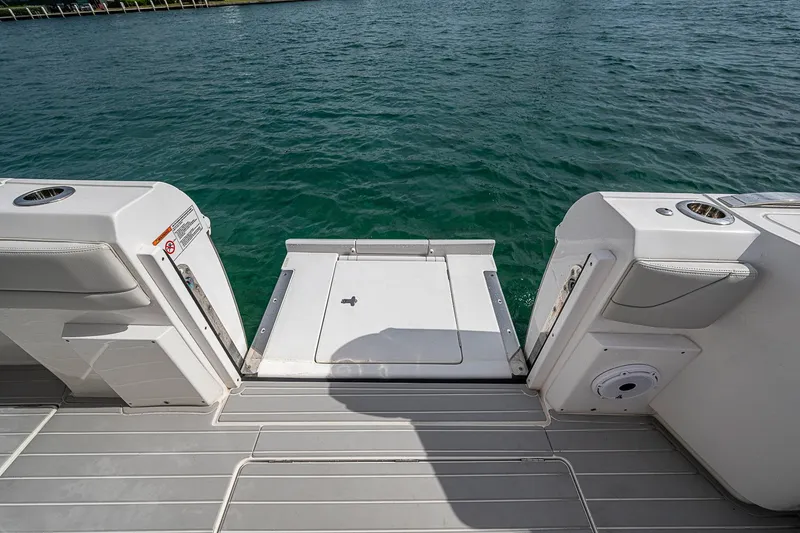 Slide: The Image of 2023 Intrepid 427 Nomad SE boat swim platform with open access to water. - 35