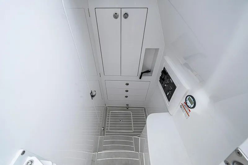 Slide: The Image of 2023 Intrepid 427 Nomad SE interior cabin with storage and control panel. - 40