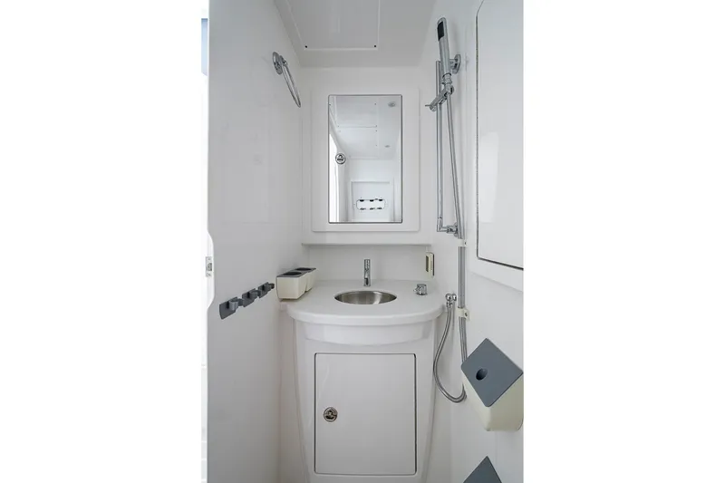 Slide: The Image of 2023 Intrepid 427 Nomad SE bathroom with modern fixtures and sleek design. - 42