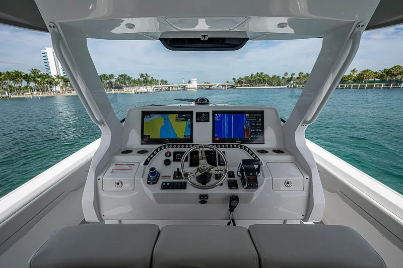 Slide: The Image of Cockpit view of 2023 Intrepid 427 Nomad SE boat with advanced navigation system. - 44