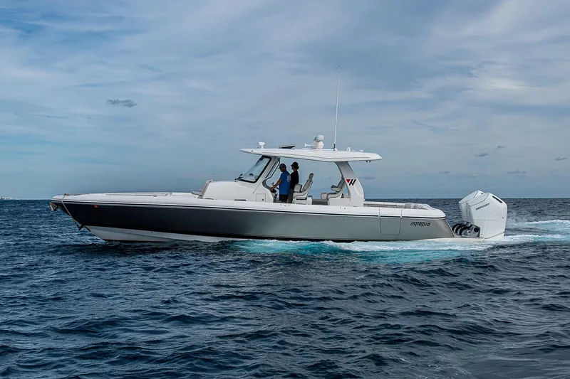 Slide: The Image of 2023 Intrepid 427 Nomad SE boat cruising on open water. - 57