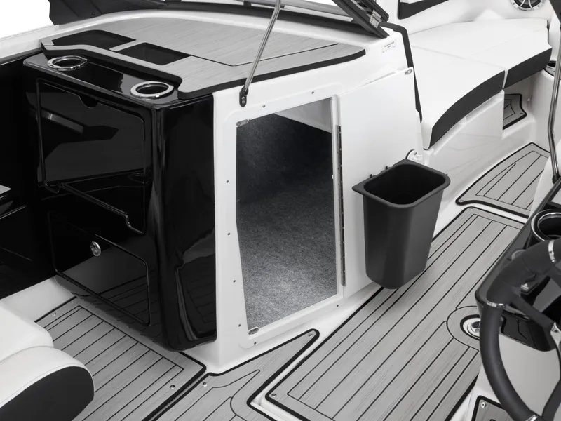Slide: The Image of Interior of Yamaha Boats 222S 2025 with storage and seating area. - 21