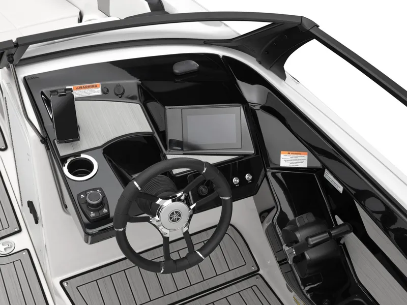 Slide: The Image of Yamaha Boats 222S 2025 cockpit with steering wheel and controls. - 22