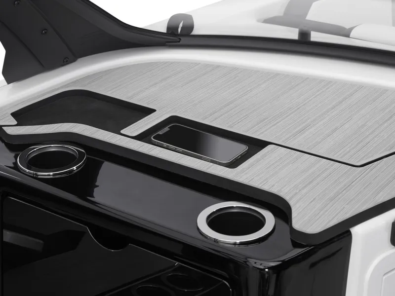 Slide: The Image of Yamaha Boats 222S 2025 dashboard with cup holders and smartphone slot. - 24