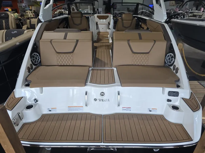 Slide: The Image of Rear view of 2025 Yamaha Boats 222S with luxurious seating. - 3