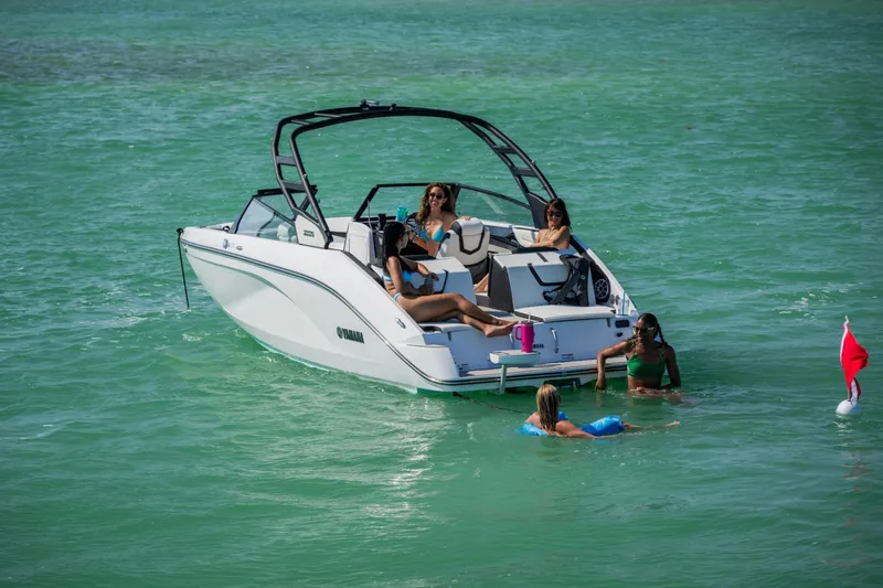 Slide: The Image of Yamaha 222S boat 2025 on water with people relaxing. - 30