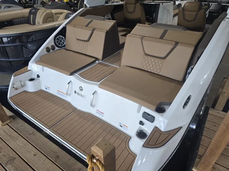 Slide: The Image of Yamaha Boats 222S 2025 with luxurious interior and wood accents. - 4