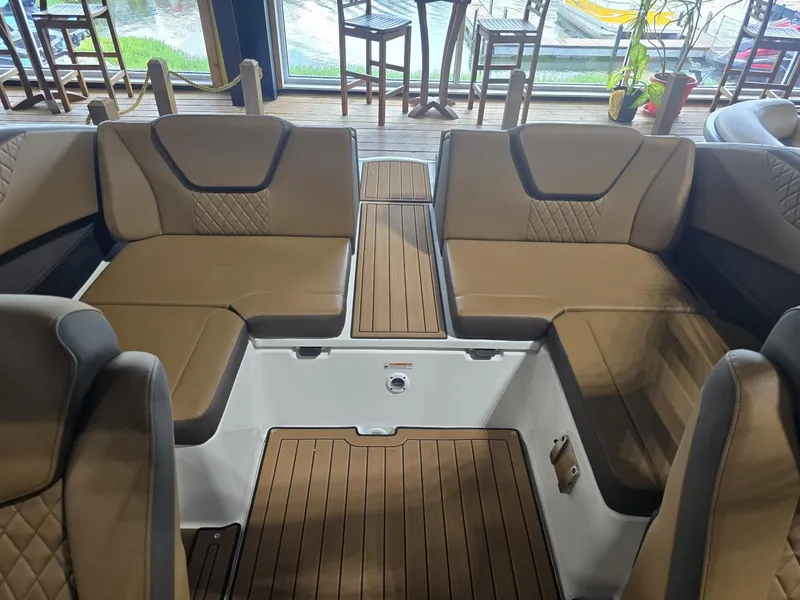 Slide: The Image of Interior of Yamaha Boats 222S 2025 with luxurious seating. - 8