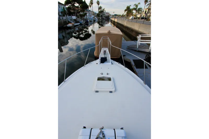 Slide: The Image of 1980 Bertram 35 Flybridge bow. - 11