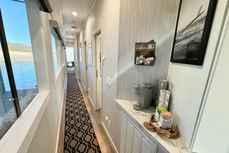 Slide: The Image of Hallway in 2021 Bravada Yachts Atlas V Series 8018 with coffee station and lake view. - 22