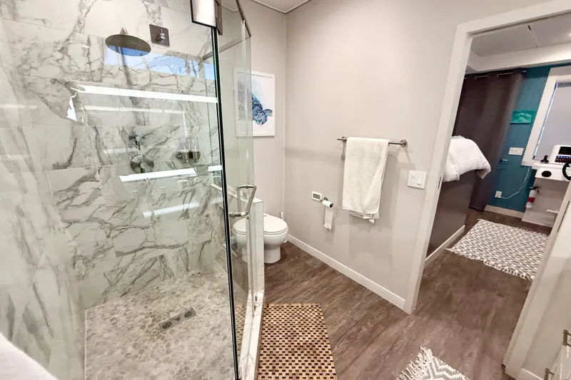 Slide: The Image of Luxurious bathroom in 2021 Bravada Yachts Atlas V Series 8018 with marble shower. - 38