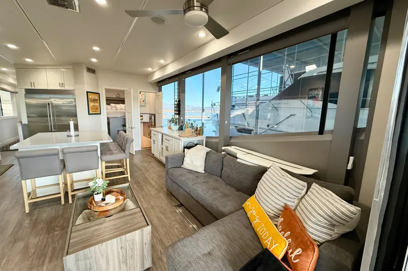 Slide: The Image of Luxurious interior of 2021 BRAVADA YACHTS Atlas V Series 8018 with modern kitchen and cozy seating. - 4