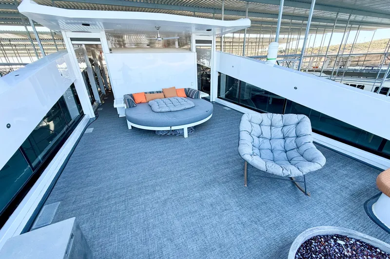 Slide: The Image of Luxurious deck of 2021 BRAVADA YACHTS Atlas V Series 8018 with modern seating. - 46