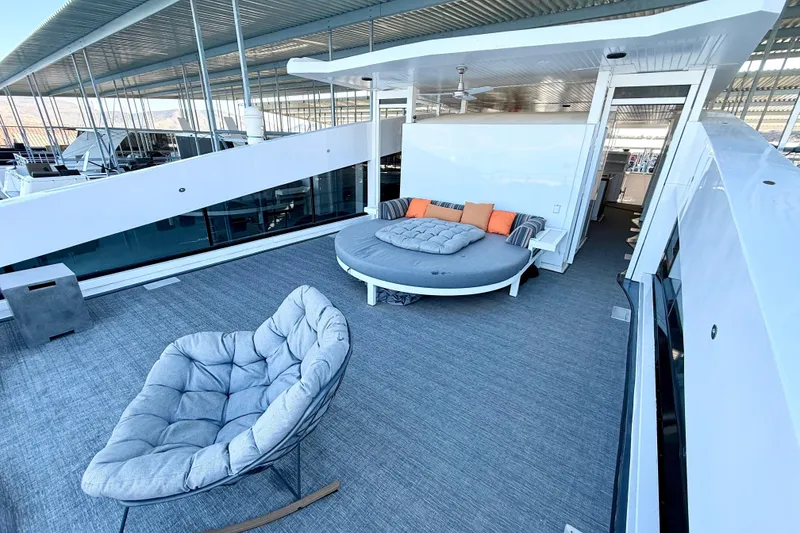 Slide: The Image of Luxurious deck of 2021 BRAVADA YACHTS Atlas V Series 8018 with modern seating. - 47