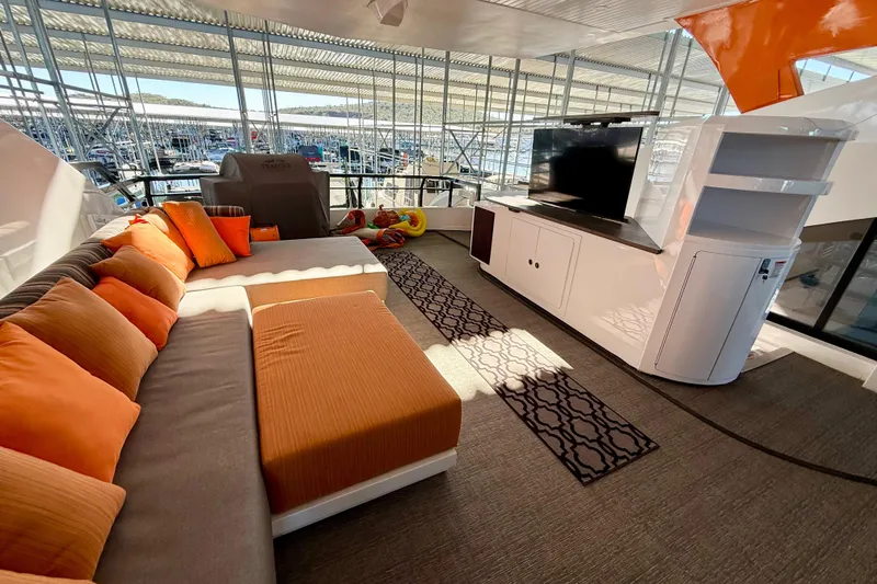 Slide: The Image of Luxurious interior of 2021 BRAVADA YACHTS Atlas V Series 8018 with modern seating and entertainment area. - 49