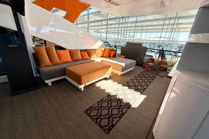 Slide: The Image of Luxurious 2021 Bravada Yachts Atlas V Series 8018 interior with modern seating and vibrant cushions. - 55