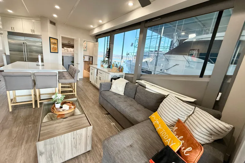 Slide: The Image of Luxurious interior of 2021 BRAVADA YACHTS Atlas V Series 8018 with modern kitchen and seating area. - 8