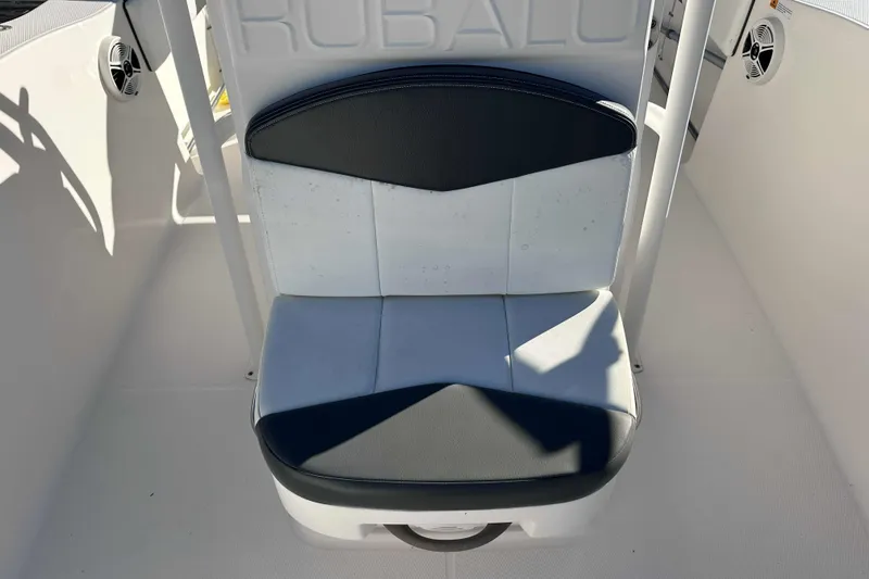 Slide: The Image of 2018 Robalo R200 Center Console boat seat with black and white upholstery. - 5