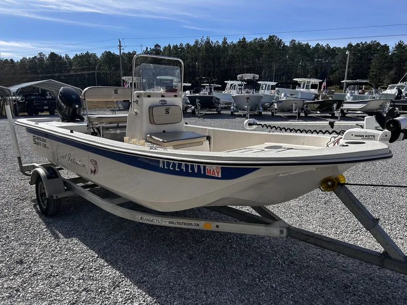 Slide: The Image of 2024 Carolina Skiff JVX18CC on trailer outdoors. - 3