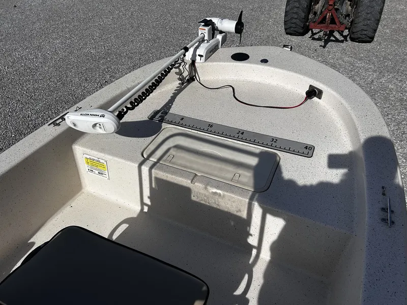 Slide: The Image of 2024 Carolina Skiff JVX18CC boat with Minn Kota trolling motor. - 9