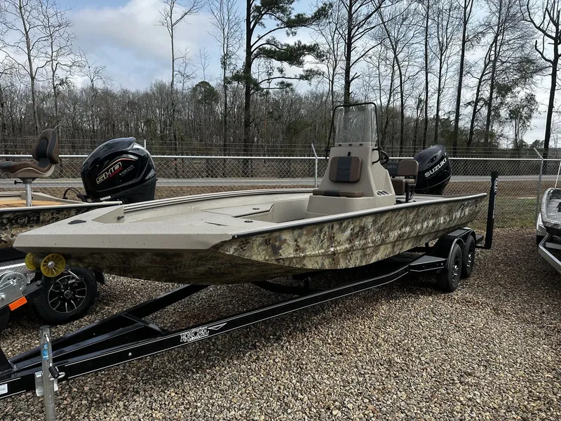 Slide: The Image of Excel 220 Bay Pro Elite 2026 on trailer outdoors. - 3