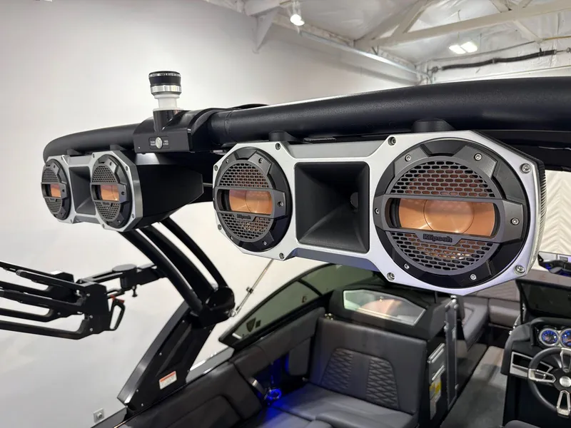Slide: The Image of 2022 MasterCraft X24 featuring premium interior speakers. - 24