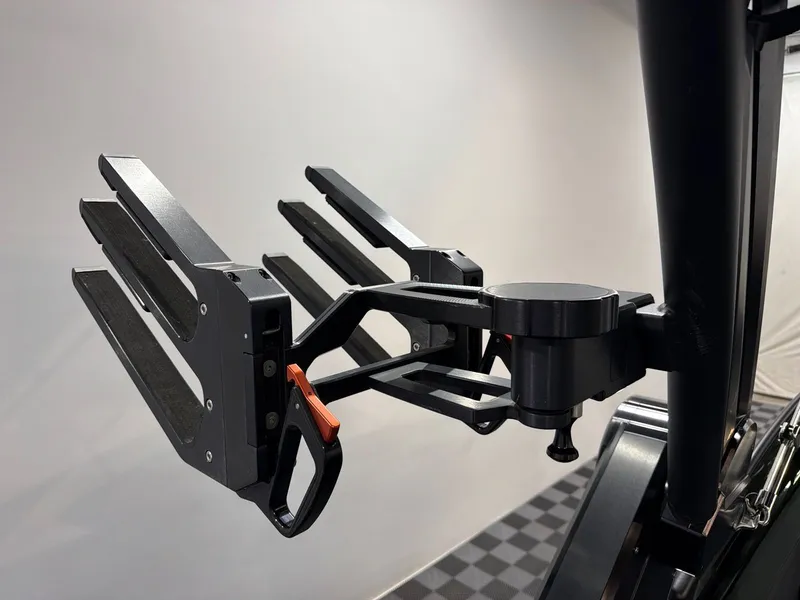 Slide: The Image of MasterCraft X24 2022 wakeboard rack, black, close-up view. - 25