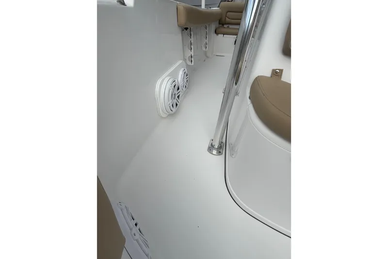 Slide: The Image of 2016 Sportsman Heritage 231 Center Console interior with speakers and seating. - 14