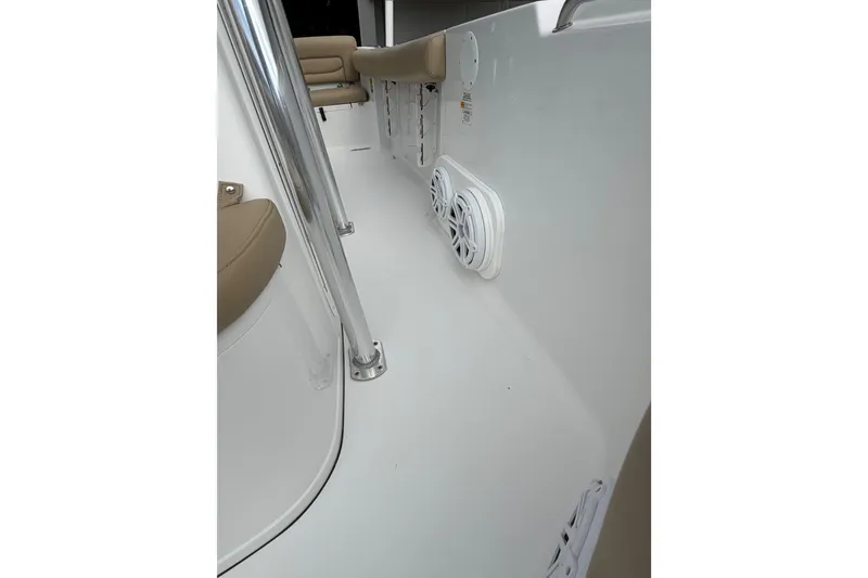 Slide: The Image of 2016 Sportsman Heritage 231 Center Console interior with speakers and seating. - 15