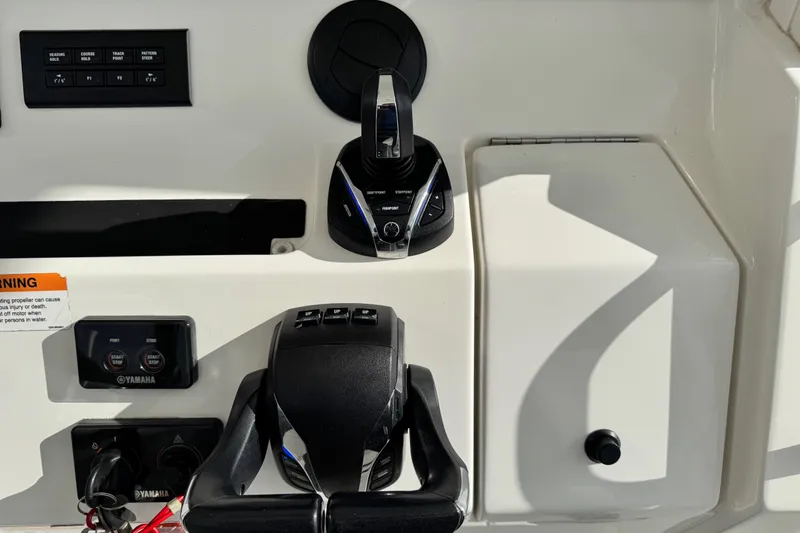 Slide: The Image of Control panel on a 2022 Regulator 34 boat with Yamaha navigation buttons. - 34