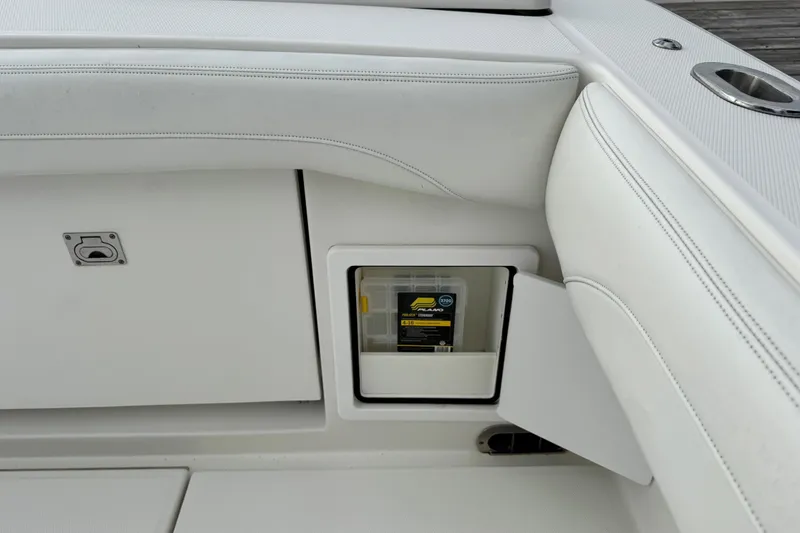 Slide: The Image of 2022 Regulator 34 boat detail showing stainless steel fitting under hardtop. - 50