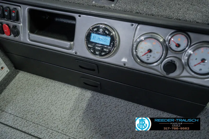 Slide: The Image of 2026 Lund 1875 Pro Guide dashboard with gauges and controls. - 25