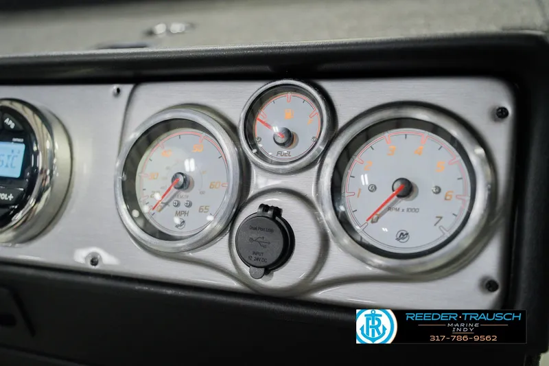 Slide: The Image of Dashboard of 2026 Lund 1875 Pro Guide boat with gauges and controls. - 34