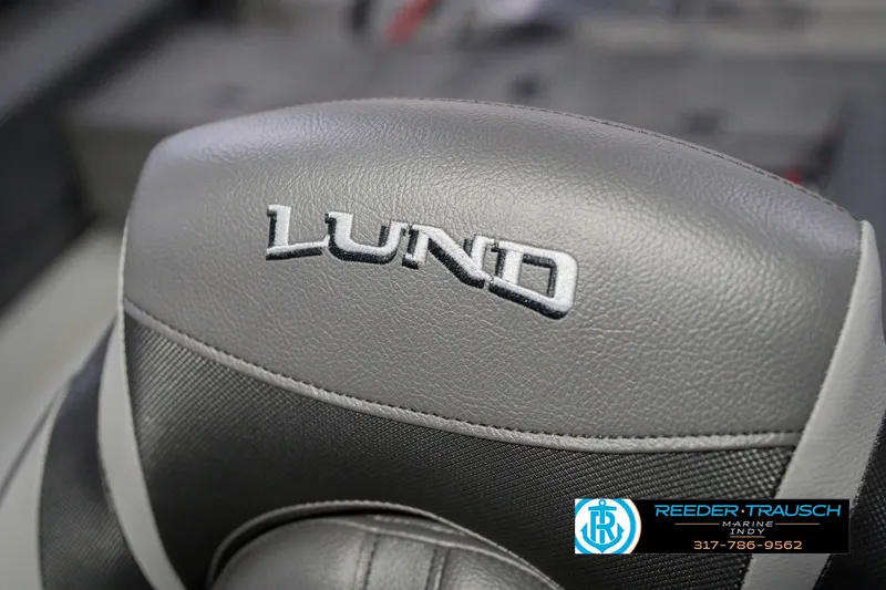 Slide: The Image of Gray leather seat with "Lund" logo, 2026 Lund 1875 Pro Guide boat. - 39
