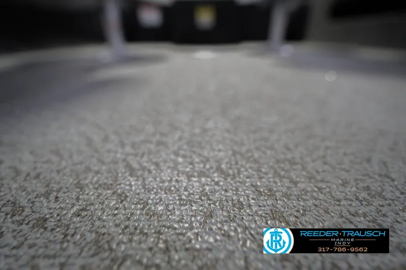 Slide: The Image of Carpeted floor of 2026 Lund 1875 Pro Guide boat, close-up view. - 41