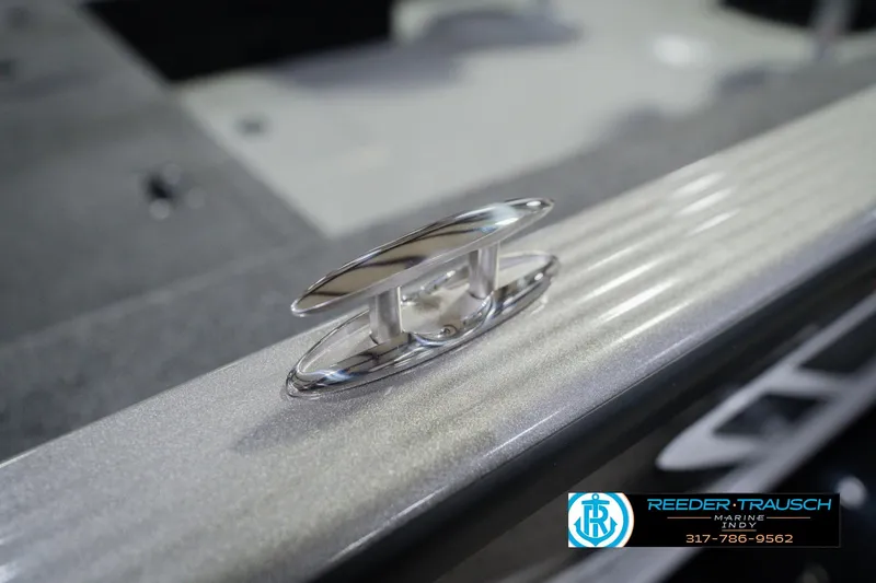 Slide: The Image of 2026 Lund 1875 Pro Guide boat cleat detail, featuring sleek metallic finish. - 56