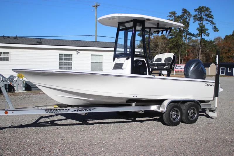 The Image of 2026 Tidewater 2110 Bay Max boat on trailer, parked outdoors. - 1