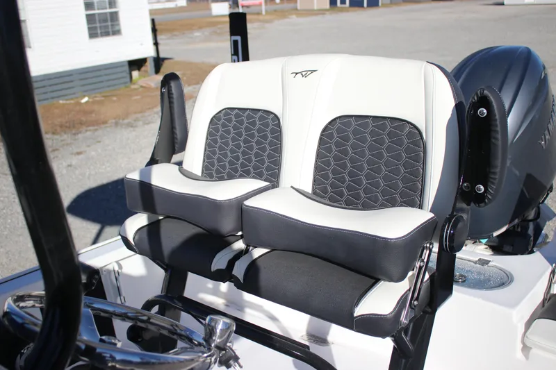 Slide: The Image of 2026 Tidewater 2110 Bay Max boat seats with black and white upholstery design. - 18