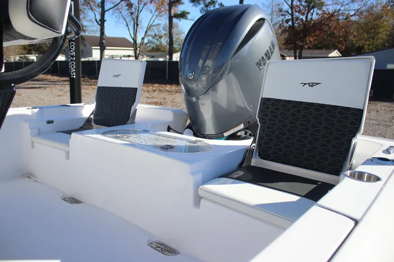 Slide: The Image of 2026 Tidewater 2110 Bay Max boat interior with Yamaha engine and stylish seating. - 20