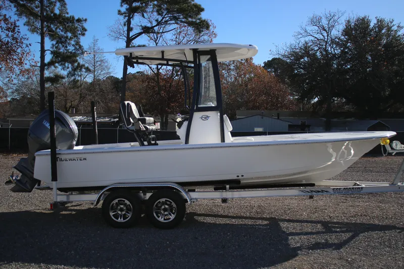 Slide: The Image of 2026 Tidewater 2110 Bay Max boat on trailer, parked outdoors. - 4