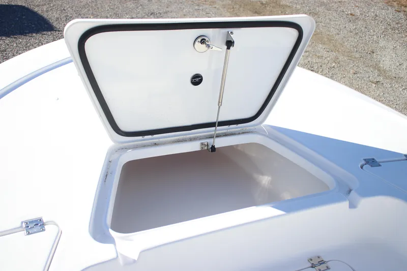 Slide: The Image of Open storage compartment on 2026 Tidewater 2110 Bay Max boat. - 9
