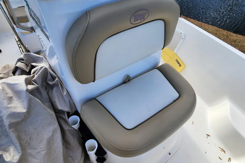 Slide: The Image of 2017 Key West 1720 Center Console boat seat with beige and white upholstery. - 12