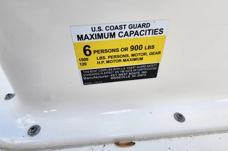 Slide: The Image of U.S. Coast Guard capacity label on 2017 Key West 1720 Center Console boat. - 15