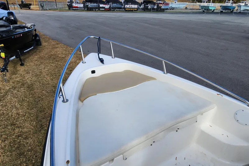 Slide: The Image of 2017 Key West 1720 Center Console boat interior with cushioned seating. - 9