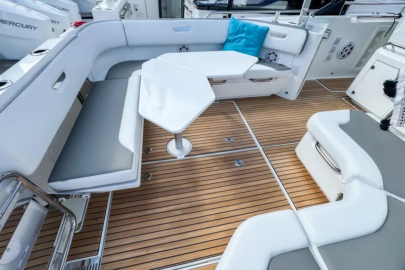 Slide: The Image of 2026 Wellcraft 38 T-Top boat interior with sleek seating and modern design. - 10