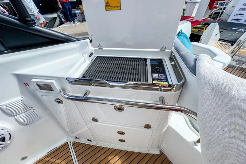 Slide: The Image of Outdoor grill on 2026 Wellcraft 38 T-Top boat, featuring sleek design and modern amenities. - 15