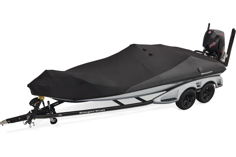 Slide: The Image of 2026 Ranger Z520 boat with Mercury Pro XS engine, parked outdoors on a sunny day. - 2